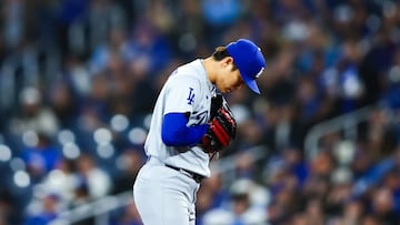 TORONTO, CANADA - APRIL 7: Yoshinobu Yamamoto #18 of the Los Angeles Dodgers prepares to deliver a pitch in the first inning of their MLB against the Toronto Blue Jays at Rogers Centre on April 7, 2026 in Toronto, Ontario, Canada.   Cole Burston/Getty Images/AFP (Photo by Cole Burston / GETTY IMAGES NORTH AMERICA / Getty Images via AFP)