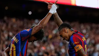 0a1aa1ec-7253-4cd7-8226-0613105a42a3-1 Barcelona, con doblete de Raphinha y de Lamine, remontan ante Rayo Vallecano