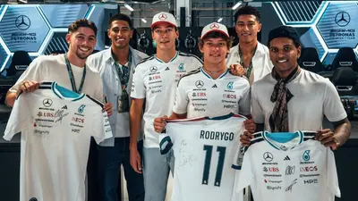 2ce538c0-6f94-4163-951b-a66f1033ed14-4 ¡De la cancha a la pista! Jugadores de Real Madrid y Atlético visitaron a Mercedes y Cadillac en la F1