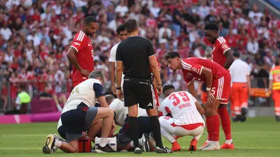 f9319e18-af7e-4ecd-aff8-e32e071777c0 Jamal Musiala se desploma en pleno partido del Bayern Munich